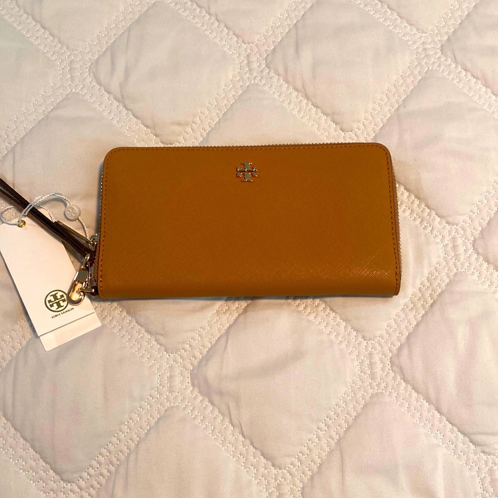NWT Tory Burch wristlet. Perfect condition, never used. Smoke free home.